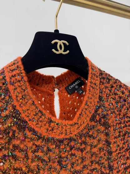 Chanel 24K black and orange shimmering knit dress with two pockets,