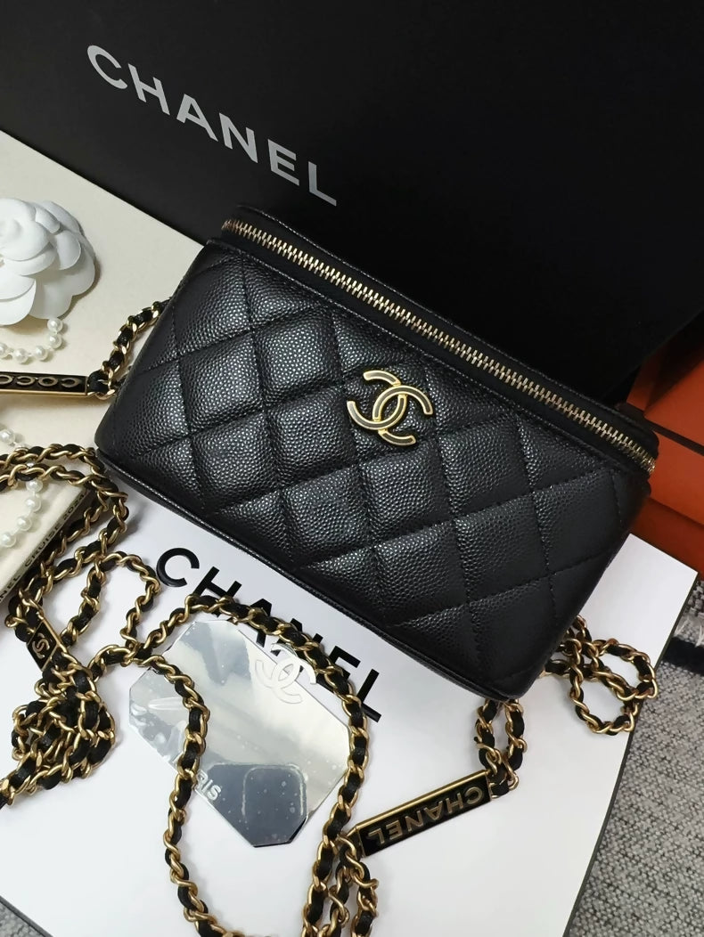 Chanel 23B black and gold lychee leather vanity bag with letter chain strap