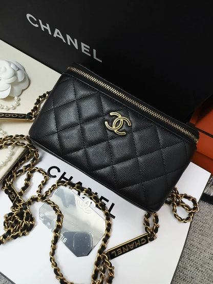 Chanel 23B black and gold lychee leather vanity bag with letter chain strap