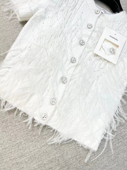 Chanel 25s white feather cardigan