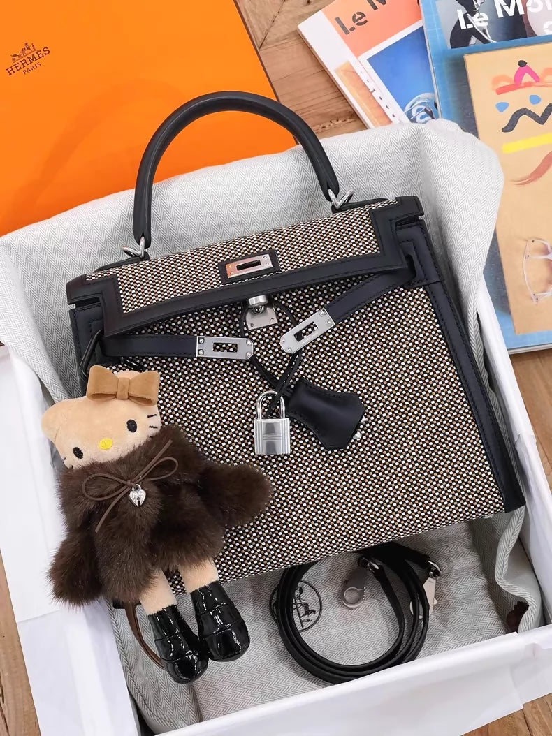Hermès Kelly 25 black leather with brown and white embossed canvas palladium hardware