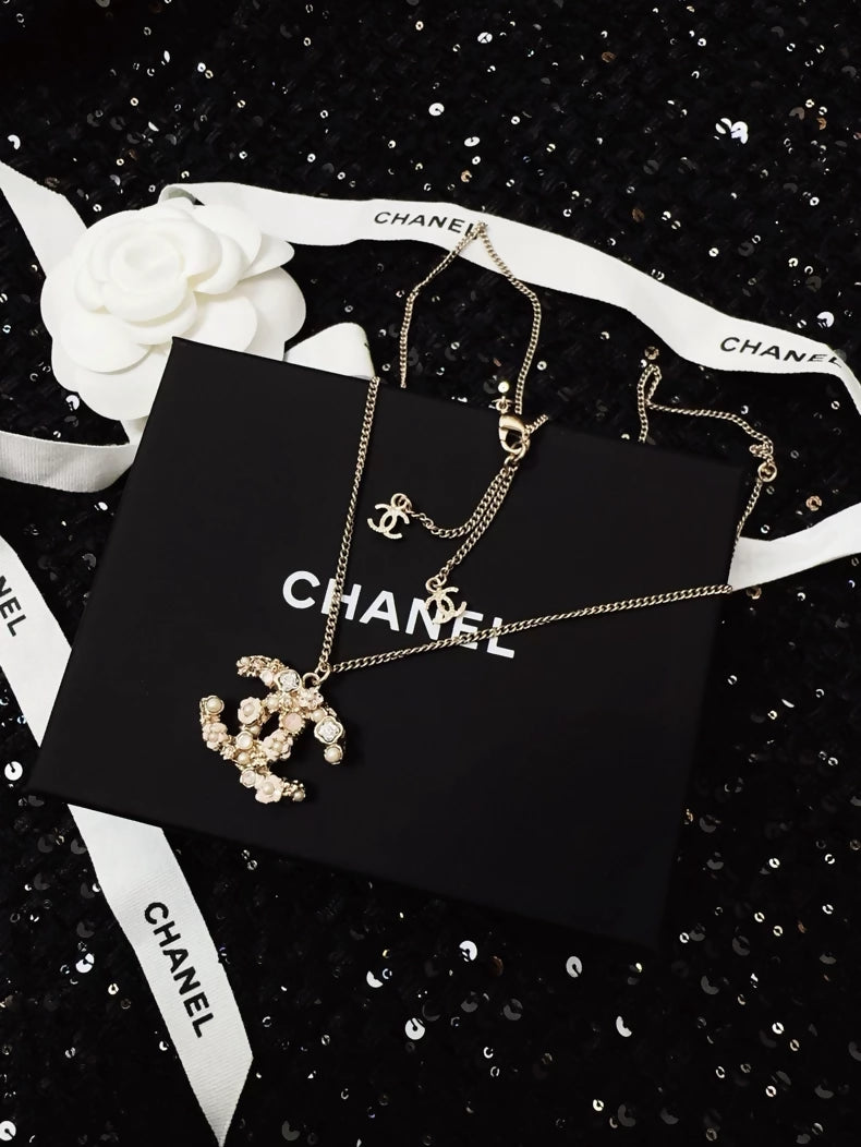 Vintage Chanel camellia and pearl necklace