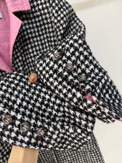 Chanel 24A long coat with black and white houndstooth pattern and pink silk lining