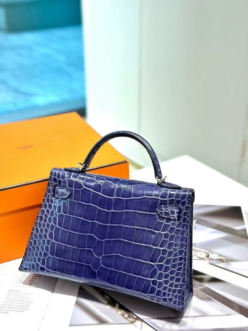 Hermes Mini Kelly 20 M3 in ink blue shiny crocodile leather