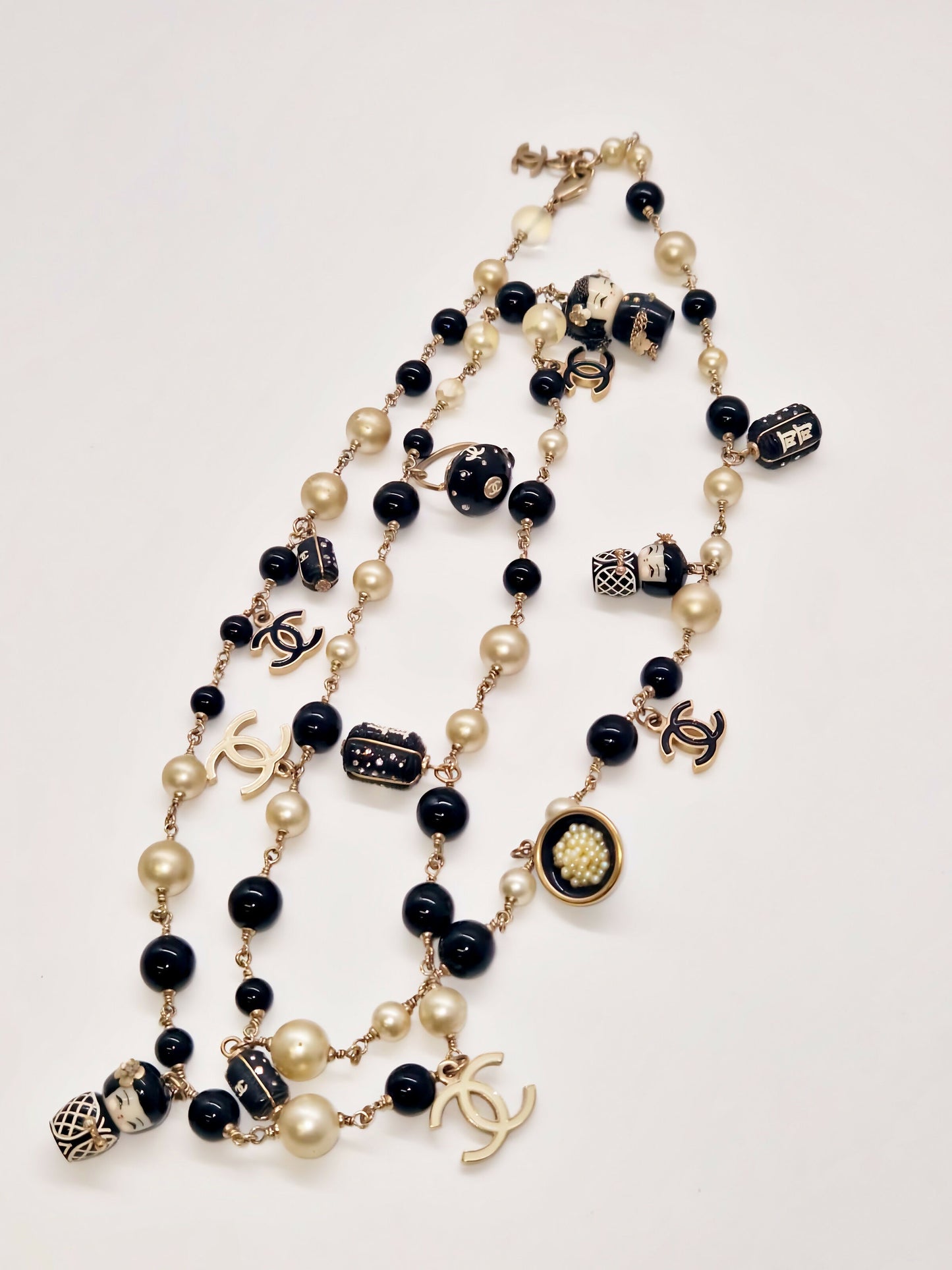 Chanel Vintage Shanghai Doll CC Necklace.