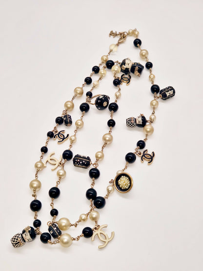 Chanel Vintage Shanghai Doll CC Necklace.