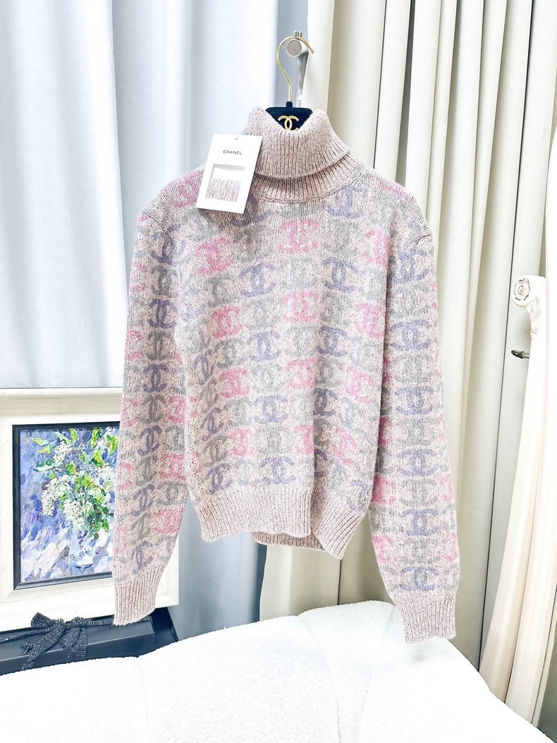 Chanel 22k pink turtleneck sweater