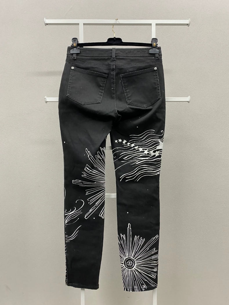 The Chanel 22C black and white graffiti denim pants