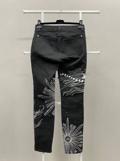The Chanel 22C black and white graffiti denim pants