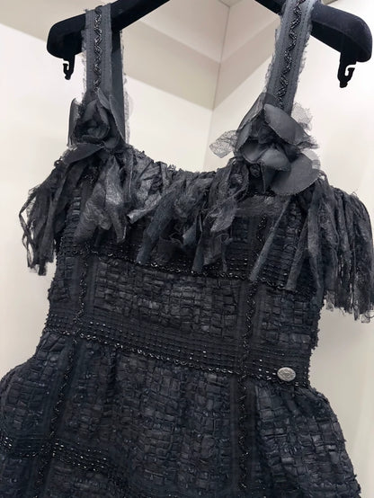 Chanel 2010 Black Dress plus camellia brooch