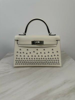 Hermès Kelly 20 Clouté Cream PHW G 2026