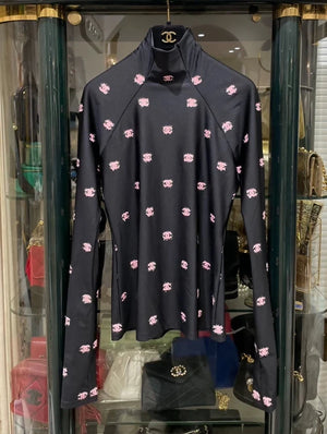 Chanel 21K ski top with pink cc logos