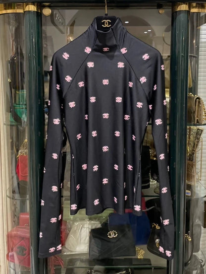 Chanel 21K ski top with pink cc logos