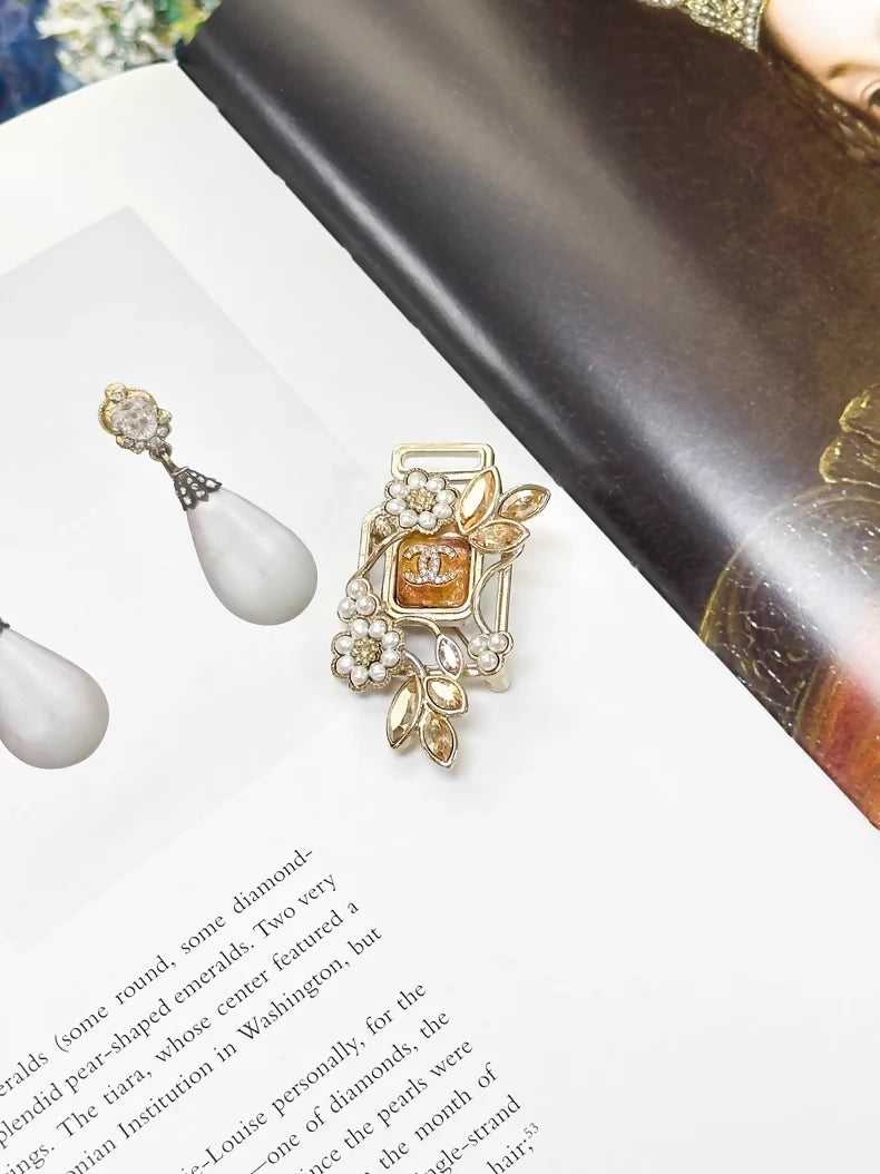 Chanel 22K pearl flower rhinestone perfume bottle glass jewelry brooch