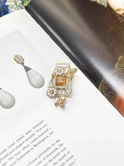 Chanel 22K pearl flower rhinestone perfume bottle glass jewelry brooch