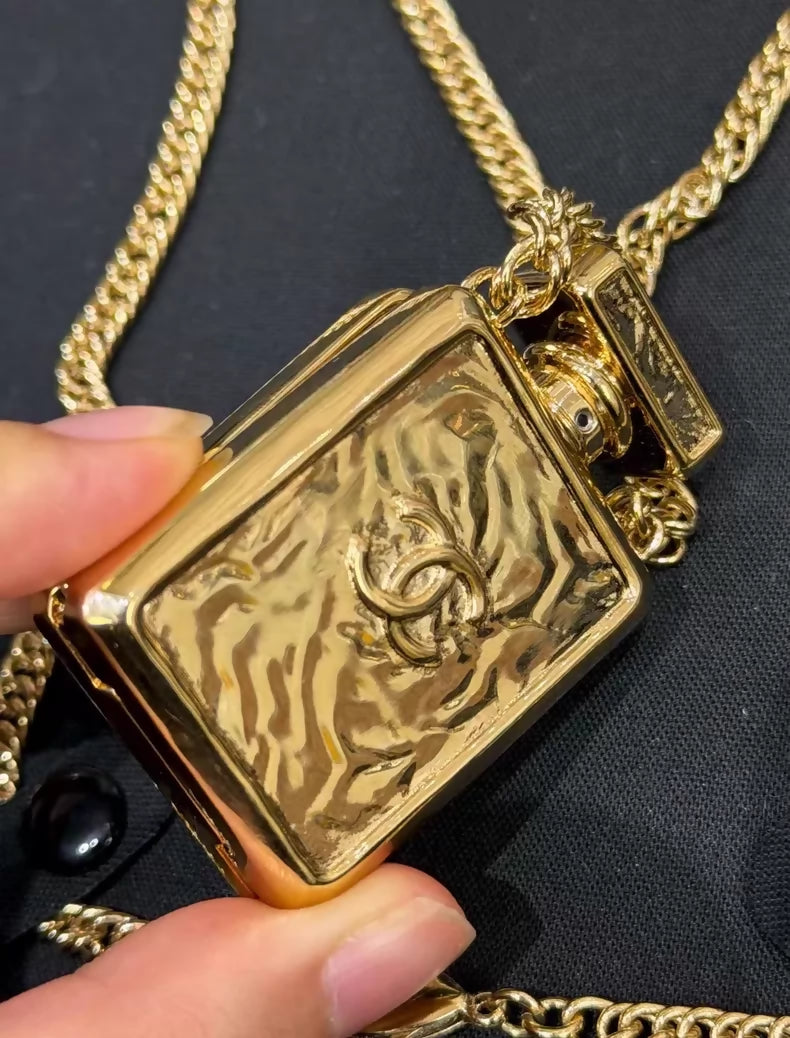Chanel perfume bottle necklace