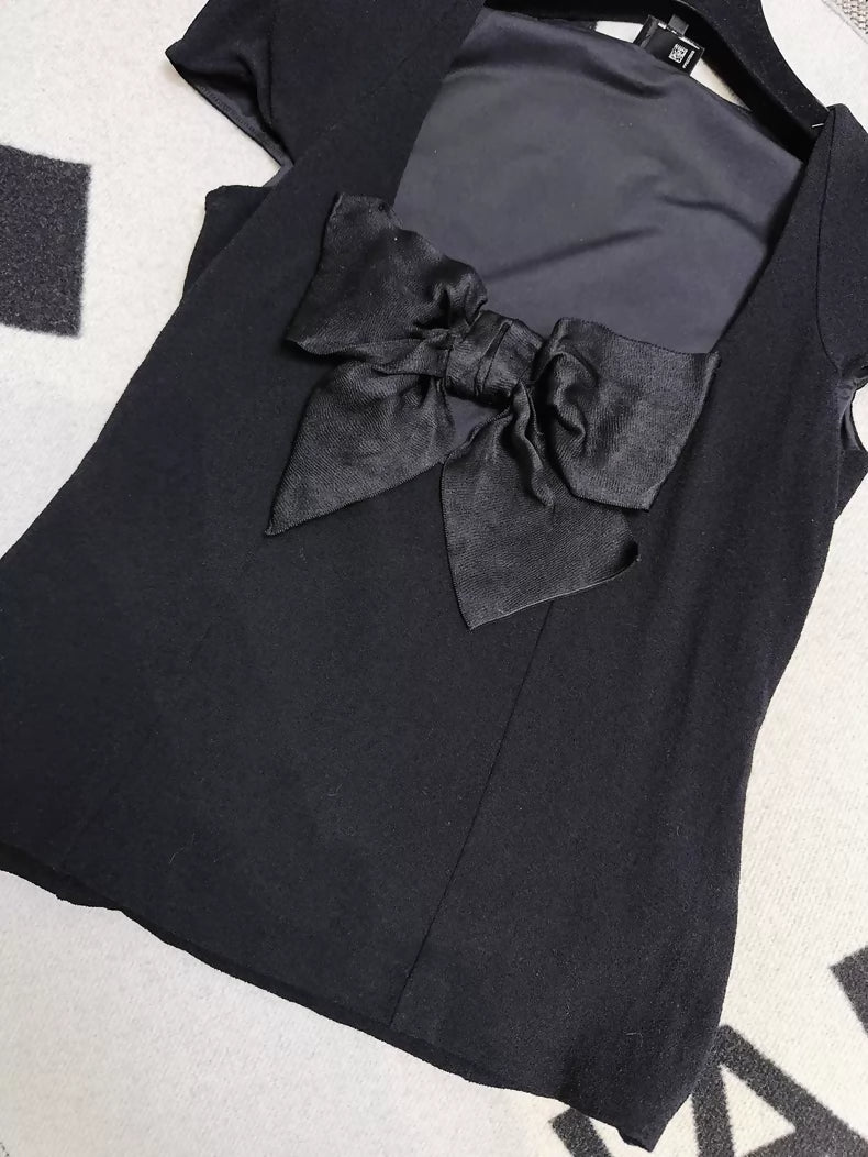 Chanel 23s black bow-tie top