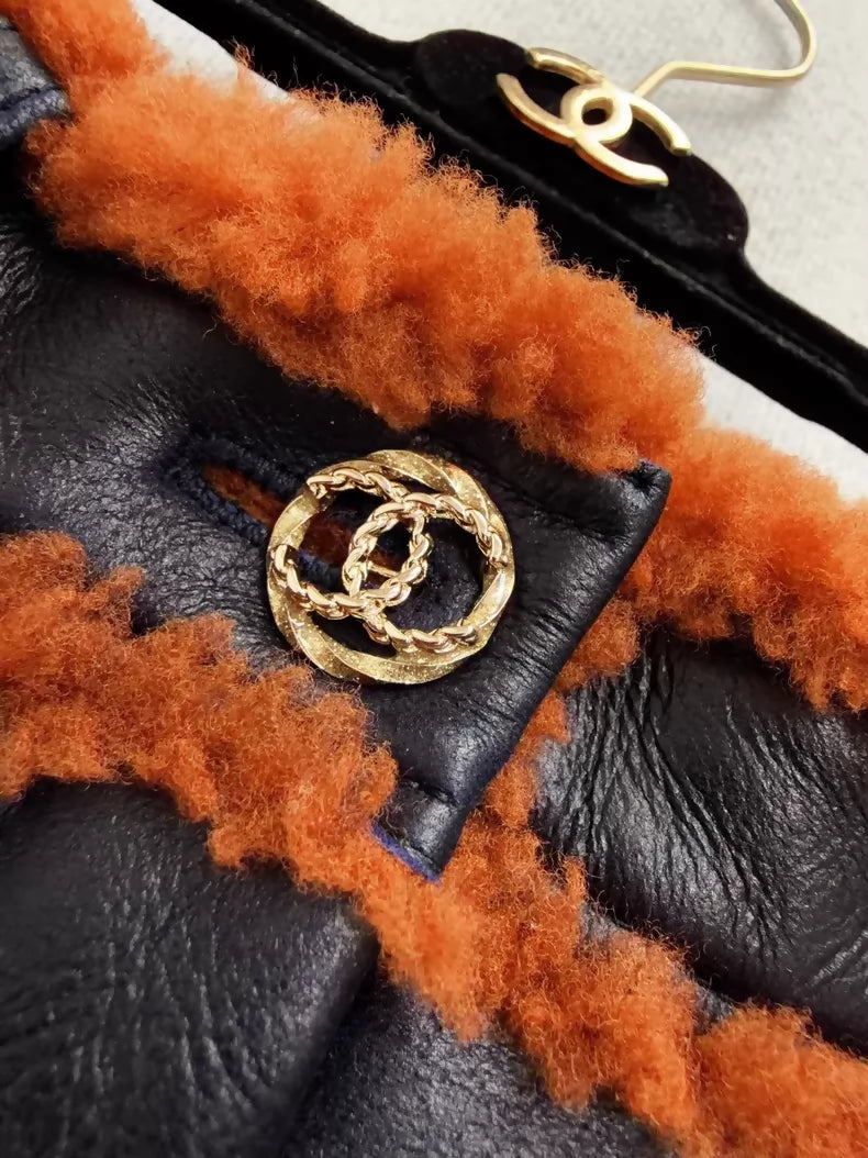 Chanel 23k black and brown shearling shorts