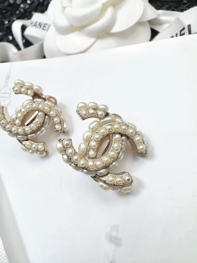 Chanel 15B clip-on earrings with double C logo and pearls