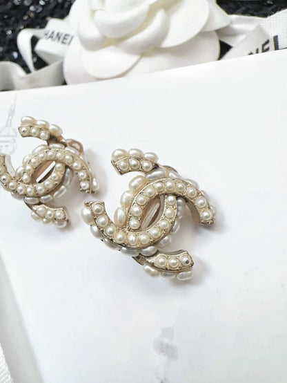 Chanel 15B clip-on earrings with double C logo and pearls