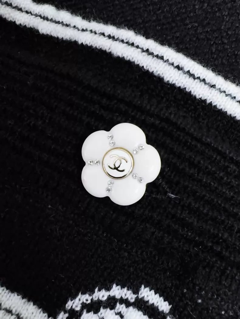 Chanel 23k black and white striped camellia double C logo knit shorts