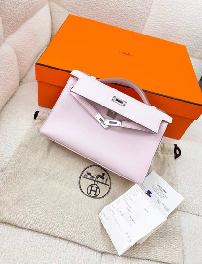 Hermès Kelly Pochette Mauve Pale Swift Palladium Hardware