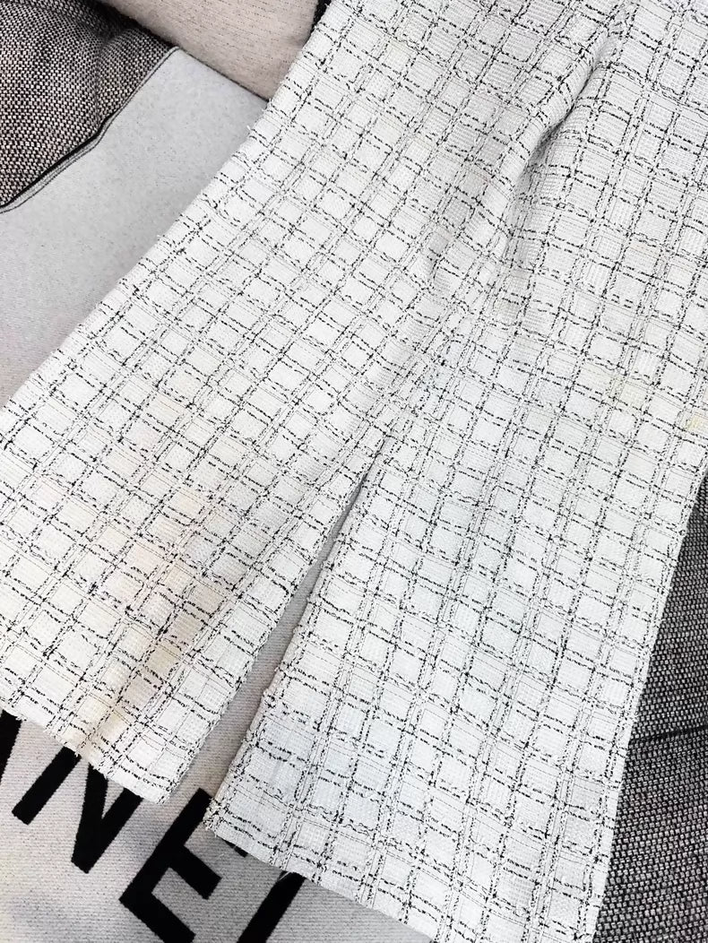 Chanel 20p black and white check wide-leg trousers