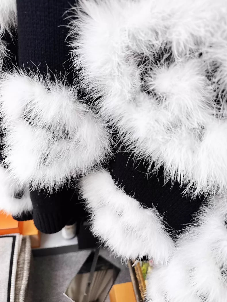 Chanel 23K white ostrich feather black camellia sweater