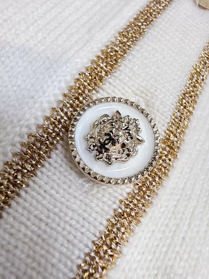 Chanel 26c white knit cardigan with gold trim and two pockets
