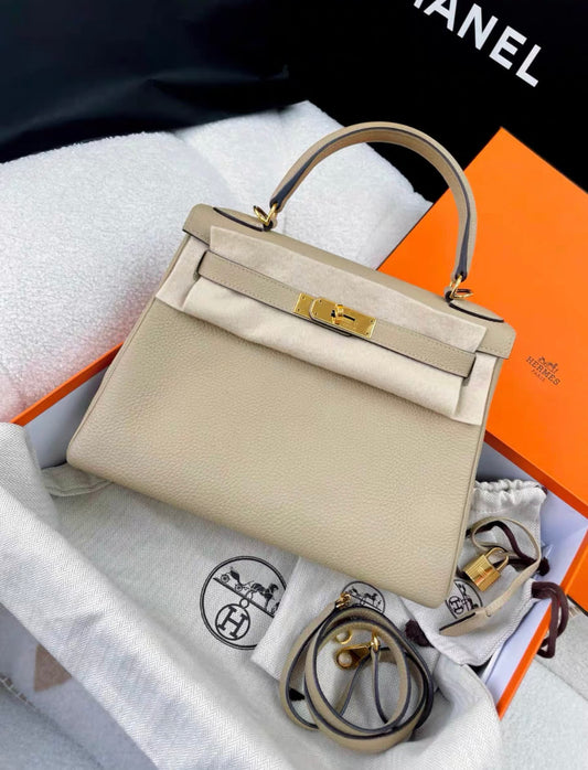 Hermès Hermes Kelly 28 gray togo leather gold hardware - Kelly 28 Crossbody Bag - Secondhand luxury from Wararni