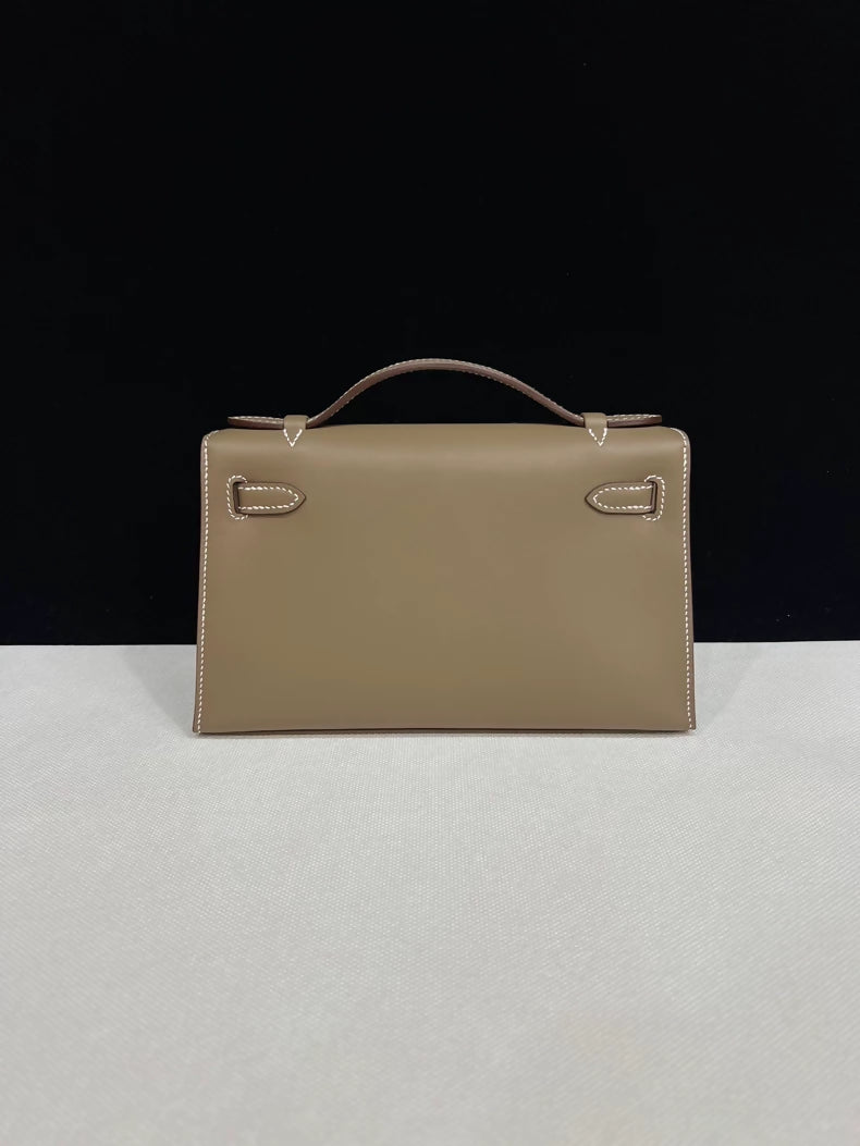 Hermes Kelly pochette étoupe grey swift leather with gold hardware