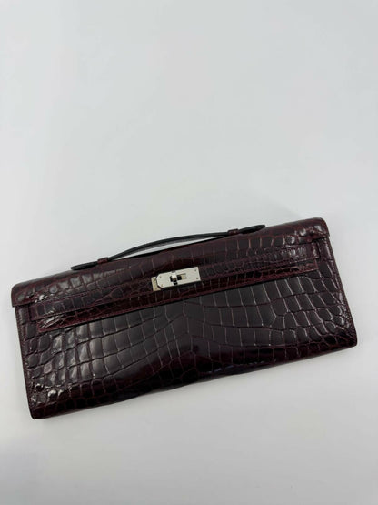 Hermès Kelly Cut Bag in Bordeaux Shiny Porosus Crocodile Leather with PHW