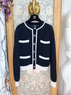 Chanel 21B classic black and white cardigan jacket