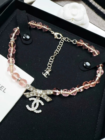 Chanel 23S full diamond bow double C pendant pink glass choker necklace