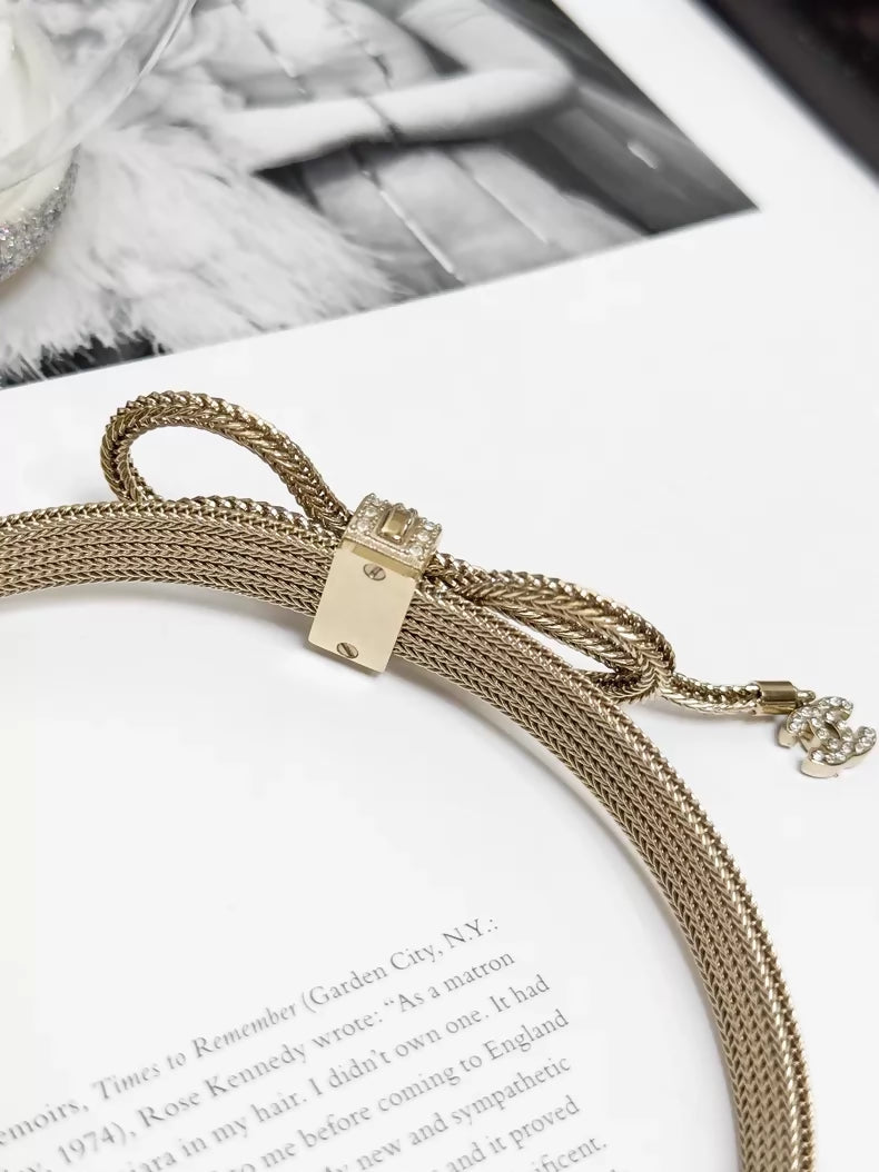 Chanel 2024 Fall/Winter collection gold bow necklace