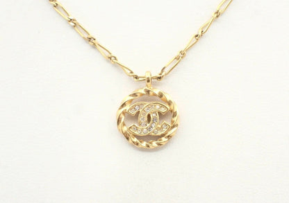 Chanel Vintage 1982 Rhinestone Gold Plated Braided Medallion Interlocking Coco Mark Necklace