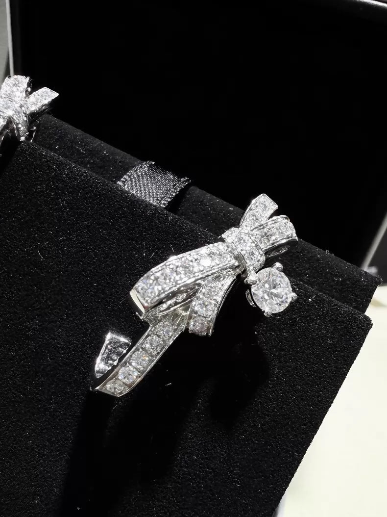 CHANEL earrings, white gold, full diamond bow, c