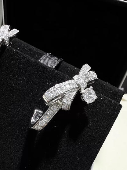 CHANEL earrings, white gold, full diamond bow, c