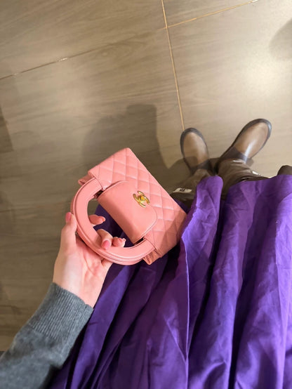 Chanel 23k Pink leather Kelly Medium size