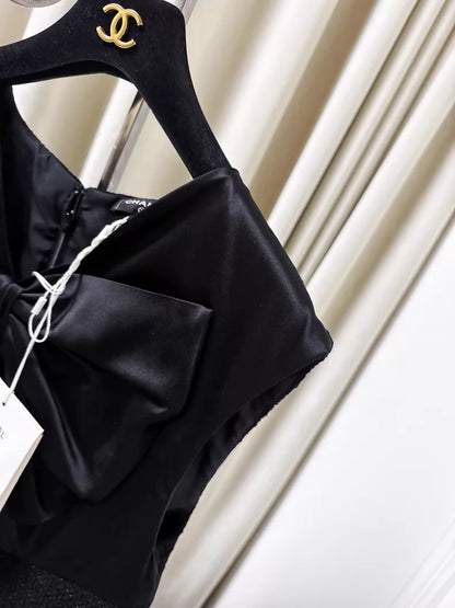 Chanel 25K black silk tweed dress