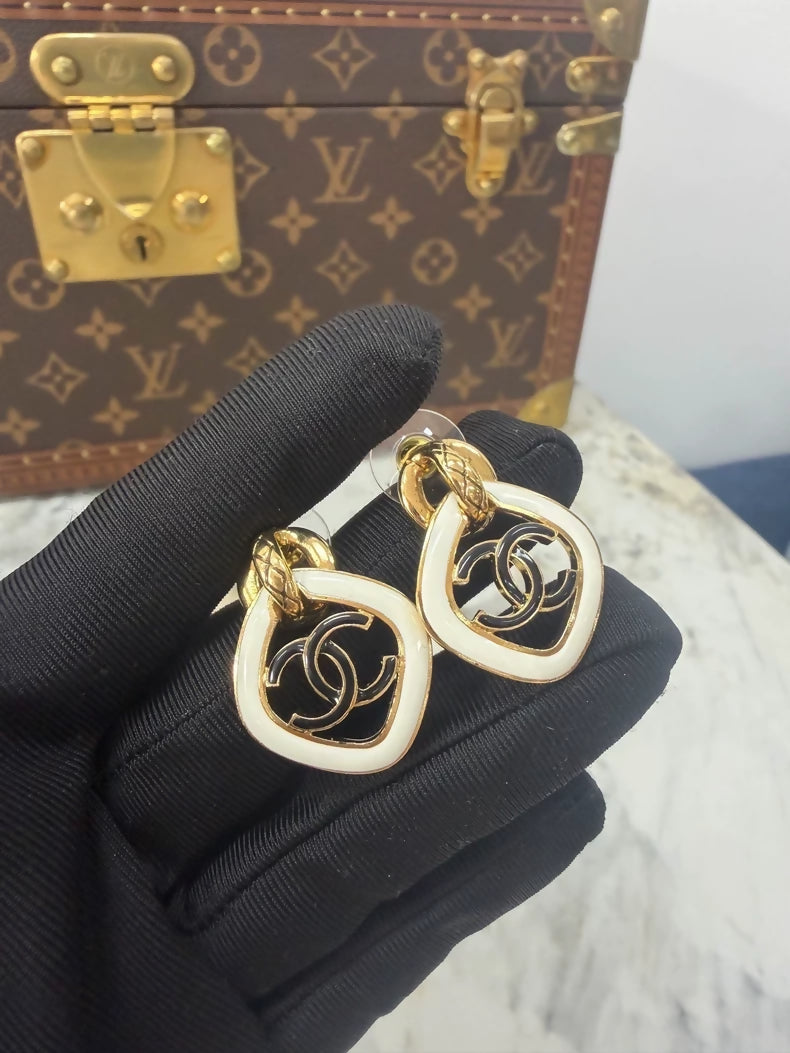 Chanel 22S Gold and Black & White Resin Double C Diamond Earrings