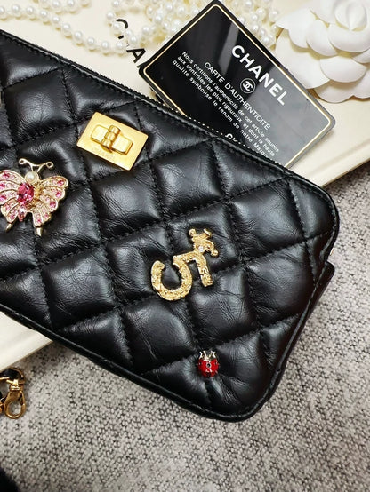 Chanel Limited Edition 2.55 leather bag with charms