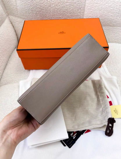 Hermès Kelly Pochette Gris Swift Gold Hardware