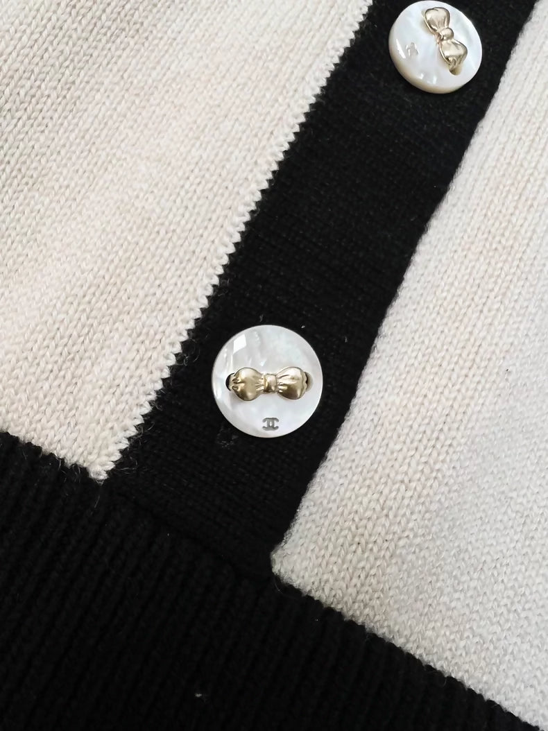 Chanel 25k beige and black two-piece knit top