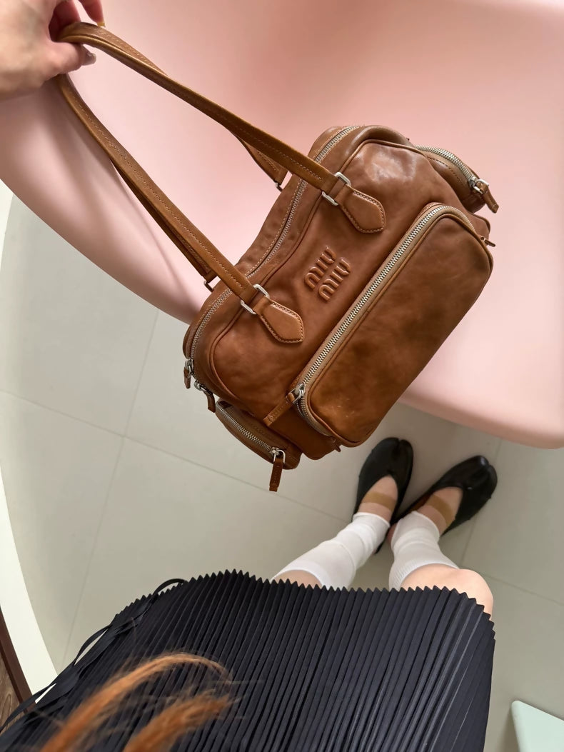 Miu Miu's Spring/Summer 2024 vintage style brown tote