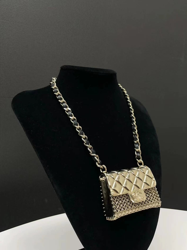 Chanel Spring/Summer 2021 mini bag necklace in leather and metal chain