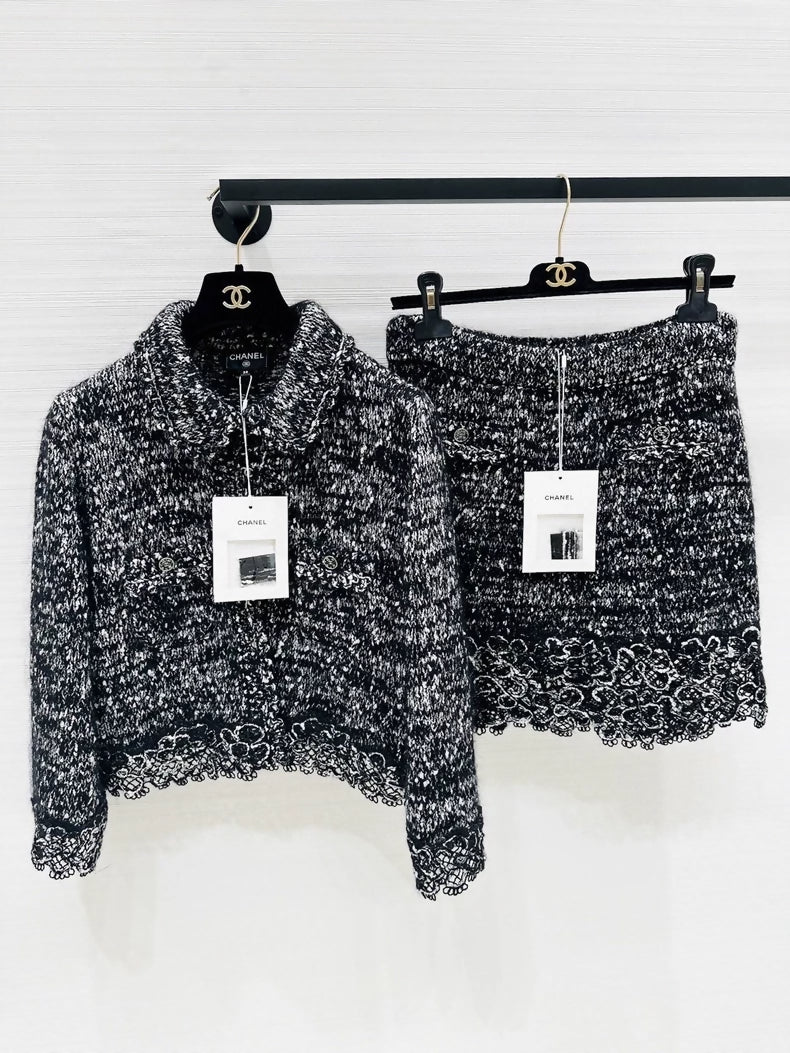 Chanel 25B black and white lace-trimmed cardigan and skirt set