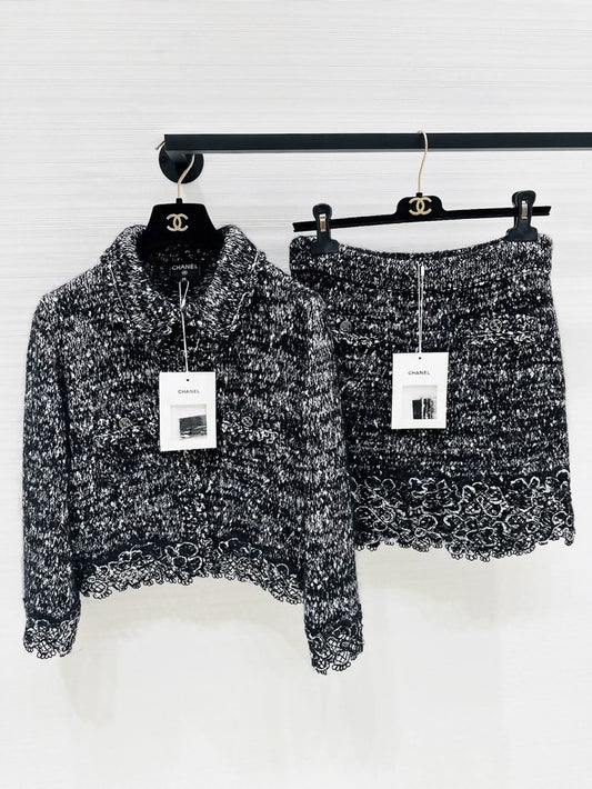 Chanel 25B black and white lace-trimmed cardigan and skirt set
