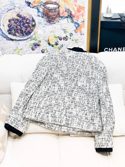 Chanel 22C black and white pearl tweed jacket