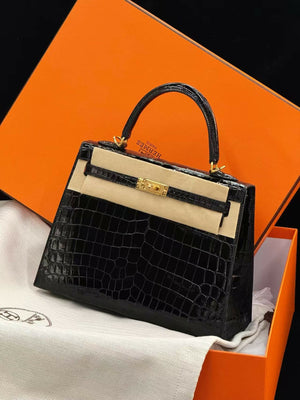 Hermès Kelly 25 Noir Shiny Porosus Crocodile with Gold Hardware